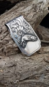 Fish and flowers on money clip